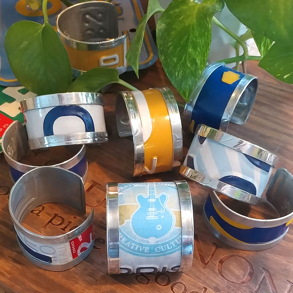 EarthSoul License Plate Cuff Bracelets are made from decommissioned automobile license plates.